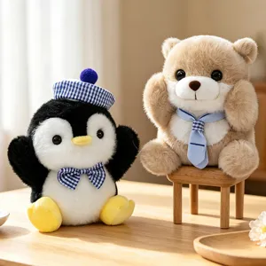 Cute penguin and bear plush toys set, soft stuffed animal doll with checkered hat for desk decor.