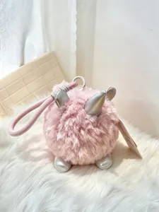 Lindo llavero de unicornio de peluche rosa con cuerno plateado, dije suave para bolso.