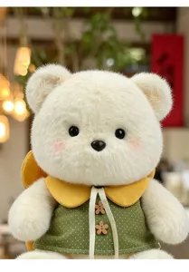 Cute white plush bear toy with green polka dot dress and flower buttons for girls.