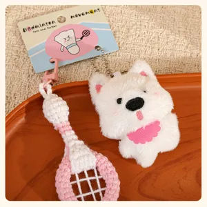 Cute West Highland white dog plush keychain with crochet badminton racket pendant for bags.