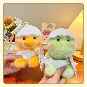 Lindo peluche de pollito y dinosaurio en cáscara de huevo con correa colgante para bolsos.