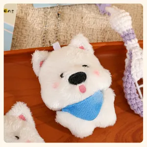 Cute white fluffy puppy plush pendant toy with blue scarf, soft keychain bag accessory charm.