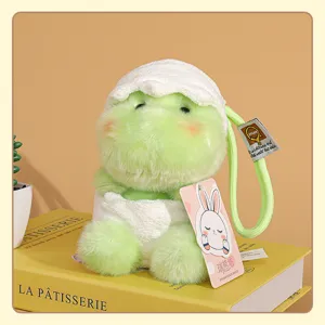 Lindo colgante de peluche de dinosaurio verde con cáscara de huevo, llavero suave para bolso.