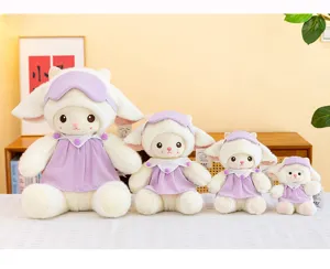 Detailed view of four cute plush sheep dolls in a row, wearing purple sleep masks and dresses.