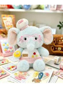 Mignon éléphant en peluche bleu avec toque de chef et lunettes, doux doudou.