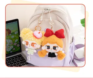 Cute cartoon girl plush doll keychain bag charm, creative fluffy key ring accessory for backpack.