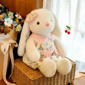 Adorable peluche de conejo de orejas largas con bonito vestido, regalo perfecto para niños.