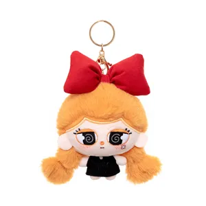 Cute plush doll keychain with big red bow and orange hair, perfect soft bag charm and toy.