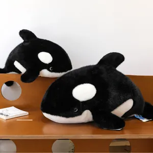 Simpatico giocattolo di peluche balena orca bambola morbida cuscino regalo dettaglio.