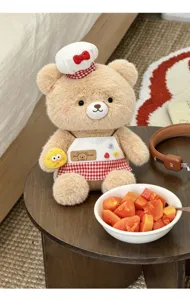 Joli peluche ours chef avec tablier et toque, belle decoration de table kawaii pour enfants.
