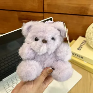 Purple plush bear keychain, cute fluffy stuffed animal toy pendant for keys and bags.