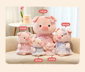Detailed scene showing assorted cute pink plush pig dolls in multiple sizes displayed together.