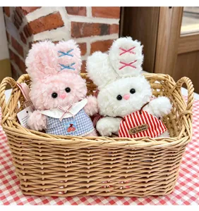 Plush bunny keychain pair in woven basket, cute stuffed animal toy gift for kids and girls.