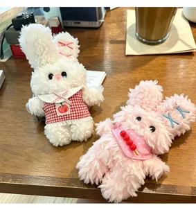 Detailed view of the cute plush rabbit pendant, soft toy doll keychain and bag ornament.
