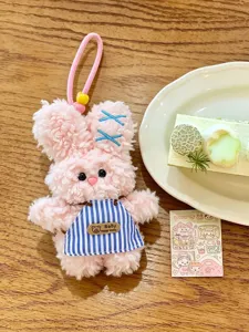 Cute plush rabbit keychain, soft bunny bag charm with striped apron for everyday style.
