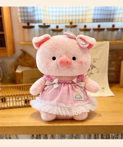 Cute pink plush pig doll wearing a sweet striped dress and bow, soft toy detail view.