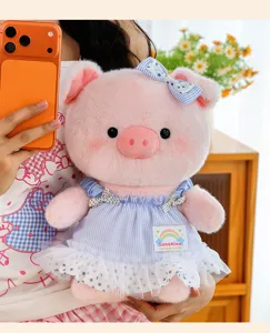 Cute pink plush pig toy wearing a sweet blue striped dress with bow, soft stuffed doll.