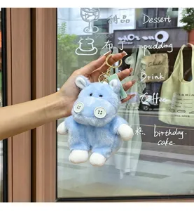 Cute blue plush doll keychain with button eyes, creative soft plush toy pendant for bags