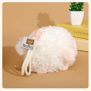 Fluffy round sheep plush pendant detailing, cute little lamb bag charm key chain soft toy.