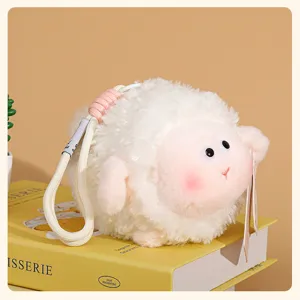 Fluffy round sheep plush keychain and bag charm, cute white stuffed animal doll pendant.