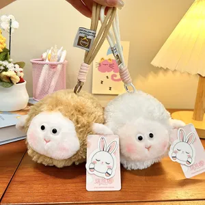Cute fluffy sheep plush keychain bag charm, soft stuffed animal doll pendant key ring.