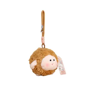 Cute round plush sheep keychain, fluffy lamb bag charm, soft stuffed animal doll pendant.