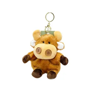 Cute plush cow keychain with button design, soft stuffed animal bag charm and key ring pendant.