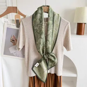 Detailed view of the 2026 autumn winter silk wool blend ribbon neck scarf with marine print.