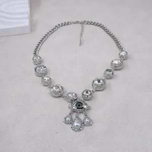 Detailed view of the European retro evil eye crystal necklace with sparkling stones and pearls.