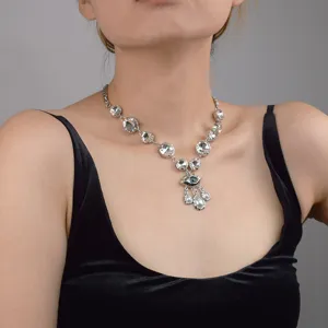 Silver rhinestone evil eye necklace with pearl pendant for women, elegant collarbone jewelry.