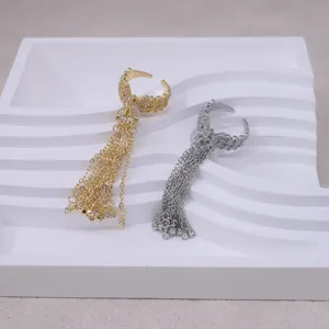 Chic bow tassel ring with sparkling zircon, elegant open-end design and long chain for women.