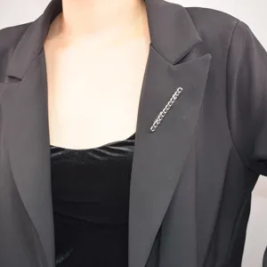 Silver chain brooch for women, gothic style suit lapel pin, trendy alloy fashion accessory.