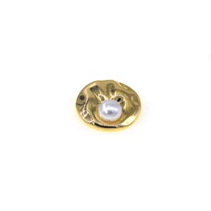 Exquisite pearl brooch detail, retro gold wavy metal texture, elegant women suit accessory.