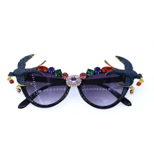 Luxury baroque style crystal swallow embellished sunglasses with gradient dark lenses for women.