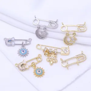 Gold-plated safety pin charm with evil eye and star details for DIY handmade jewelry crafts.