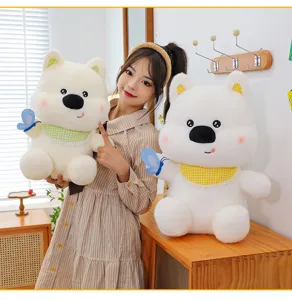 Adorable peluche de chien Westie avec bavette à carreaux et papillon, chiot en peluche doux.