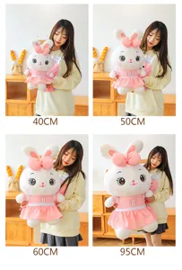 Cute bunny plush toy with pink dress and bow, soft stuffed animal pillow gift for girls.