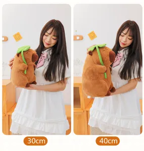 Cute capybara plush toy with green leaf, soft stuffed animal doll in 30cm and 40cm sizes.
