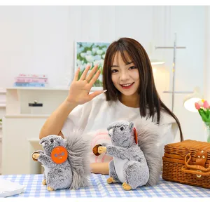 Detailed shot of a cute simulation squirrel plush toy with a pine cone, ideal display.