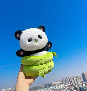 Cute panda plush toy inside bamboo shoot container, soft stuffed animal gift for kids.