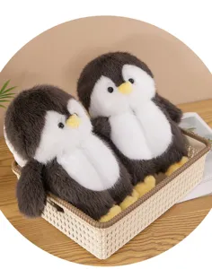 Plush penguin winter home slippers detail view, soft cozy fluffy indoor footwear with anti-slip sole.