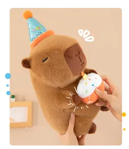 Capybara plush toy cute stuffed animal doll with birthday hat and cake detail view gift.