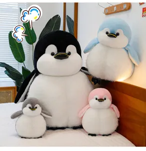 Soft plush fat penguin doll detail view, cute stuffed animal pillow for kids and room decor.