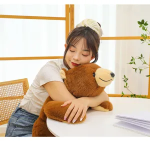 Close-up scene of a soft brown plush bear toy in cozy setting, great for daily comfort.