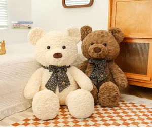 Grand nounours en peluche avec nœud, adorable poupée animale douce pour cadeau d'anniversaire.
