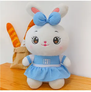 Cute plush rabbit toy with blue dress and bow, soft stuffed animal doll for kids gift sleeping.