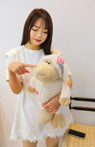 Detailed close-up showing the soft and fluffy texture of the cute plush sheep toy in a scenic view.