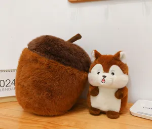 Close-up detail shot of cute acorn plush pillow and fluffy squirrel doll on wooden desk setup.