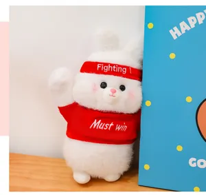 Cute cheering rabbit plush toy doll detail close-up, soft cartoon stuffed animal gift.