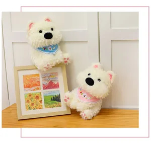Adorable sitting West Highland white dog plush toy with cute bib, perfect birthday gift.